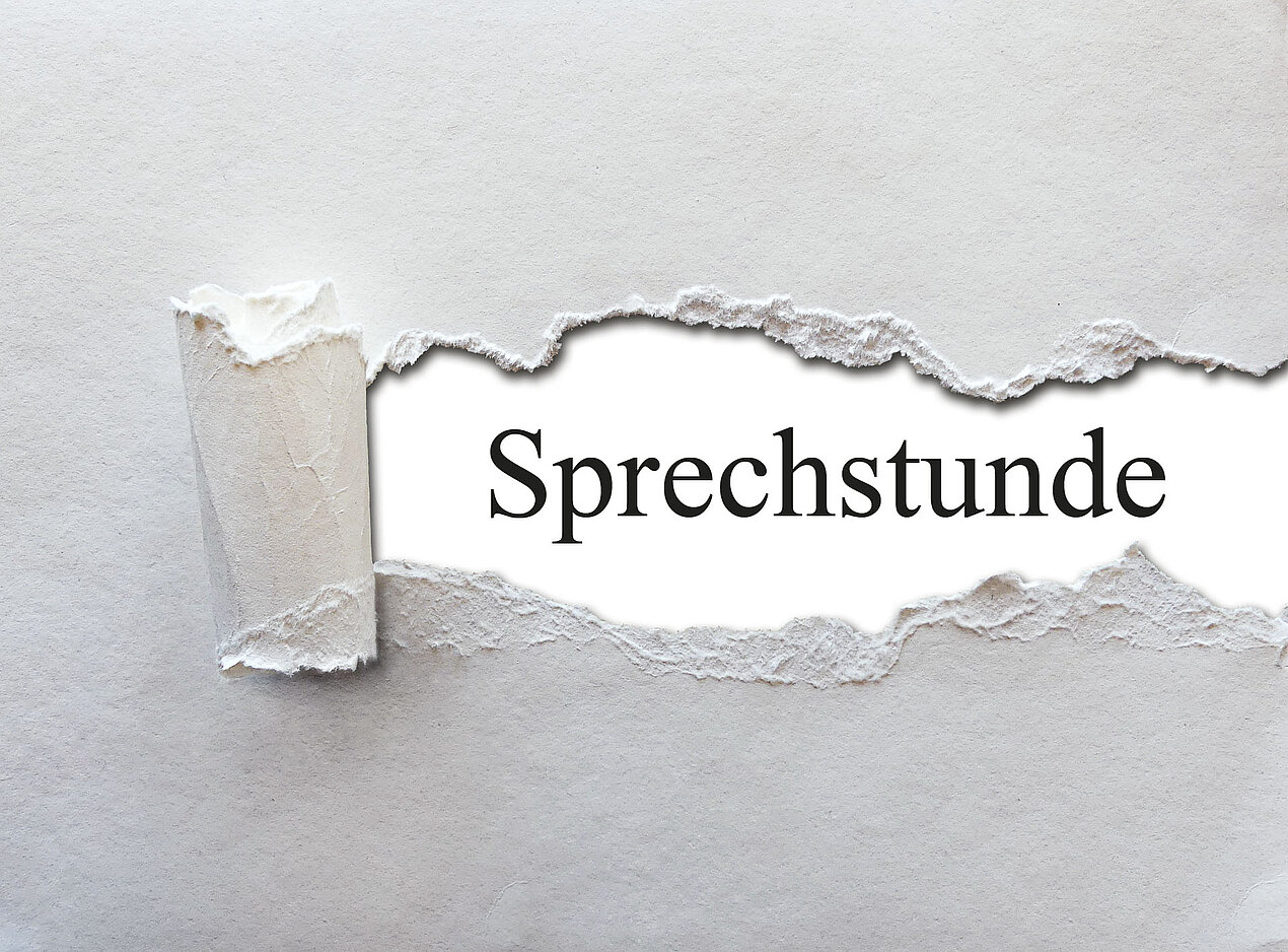 Zerrissenes Papier und unter dem Riss der Schriftzug Sprechstunde
