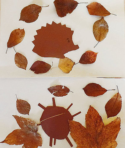 Ein gebasteltes Herbstbild aus bunten Blättern